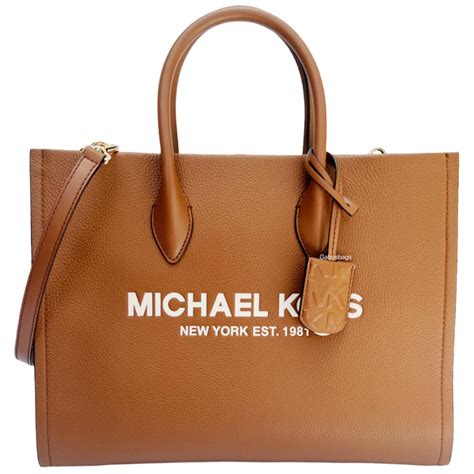 michael kors mirella tote brown|michael kors brown leather backpack.